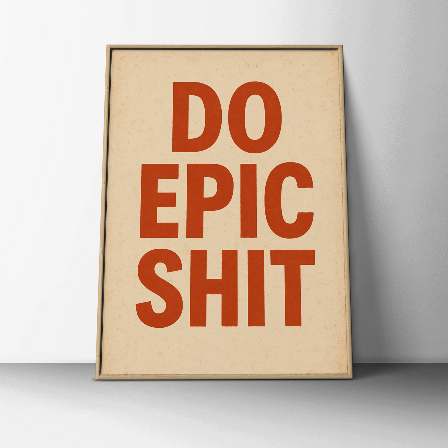 Do Epic Shit motivational poster with burnt-orange block lettering on a cream background