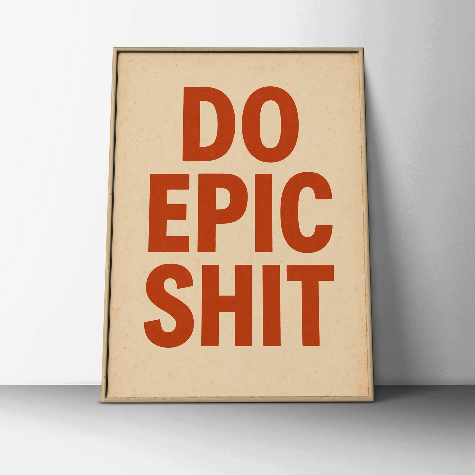 Do Epic Shit motivational poster with burnt-orange block lettering on a cream background
