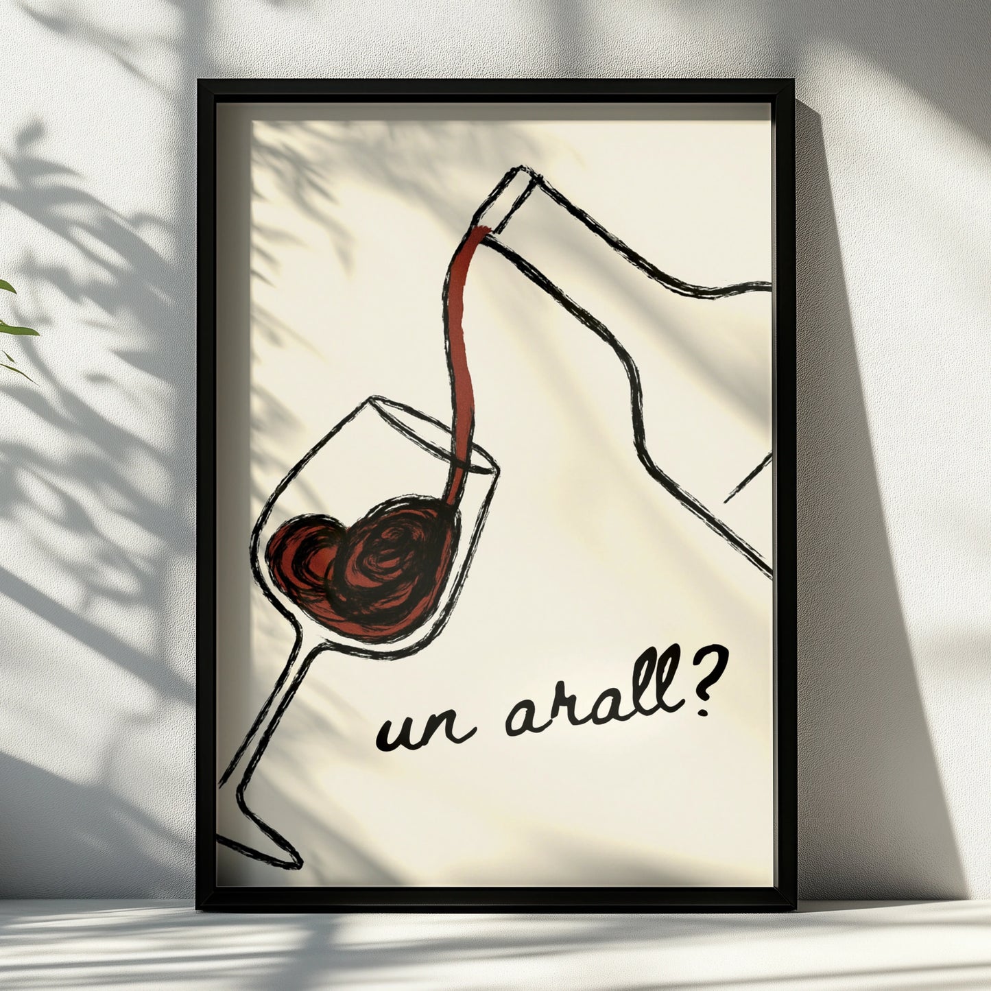 Red wine pouring into a glass with the Welsh words un arall on cream