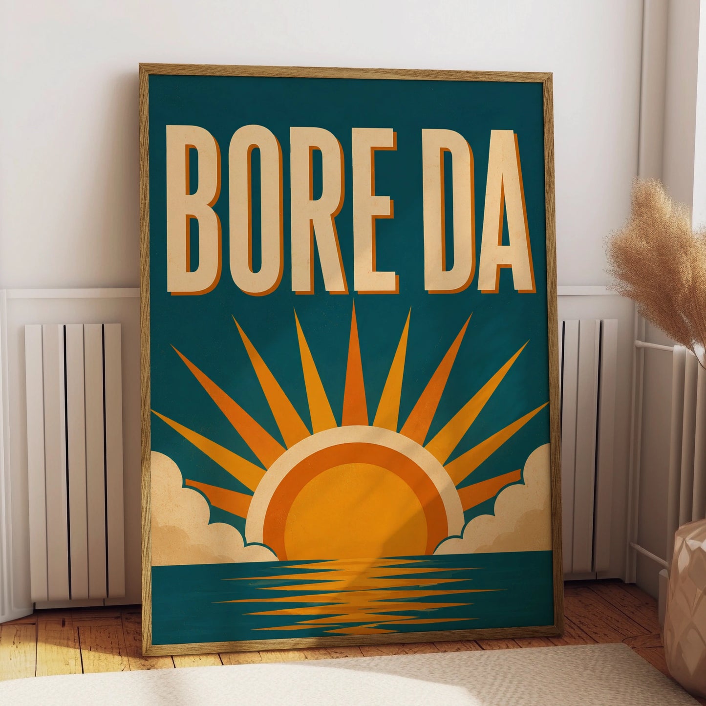 Bore Da Welsh poster with cream lettering and orange sunrise over a teal-blue sea