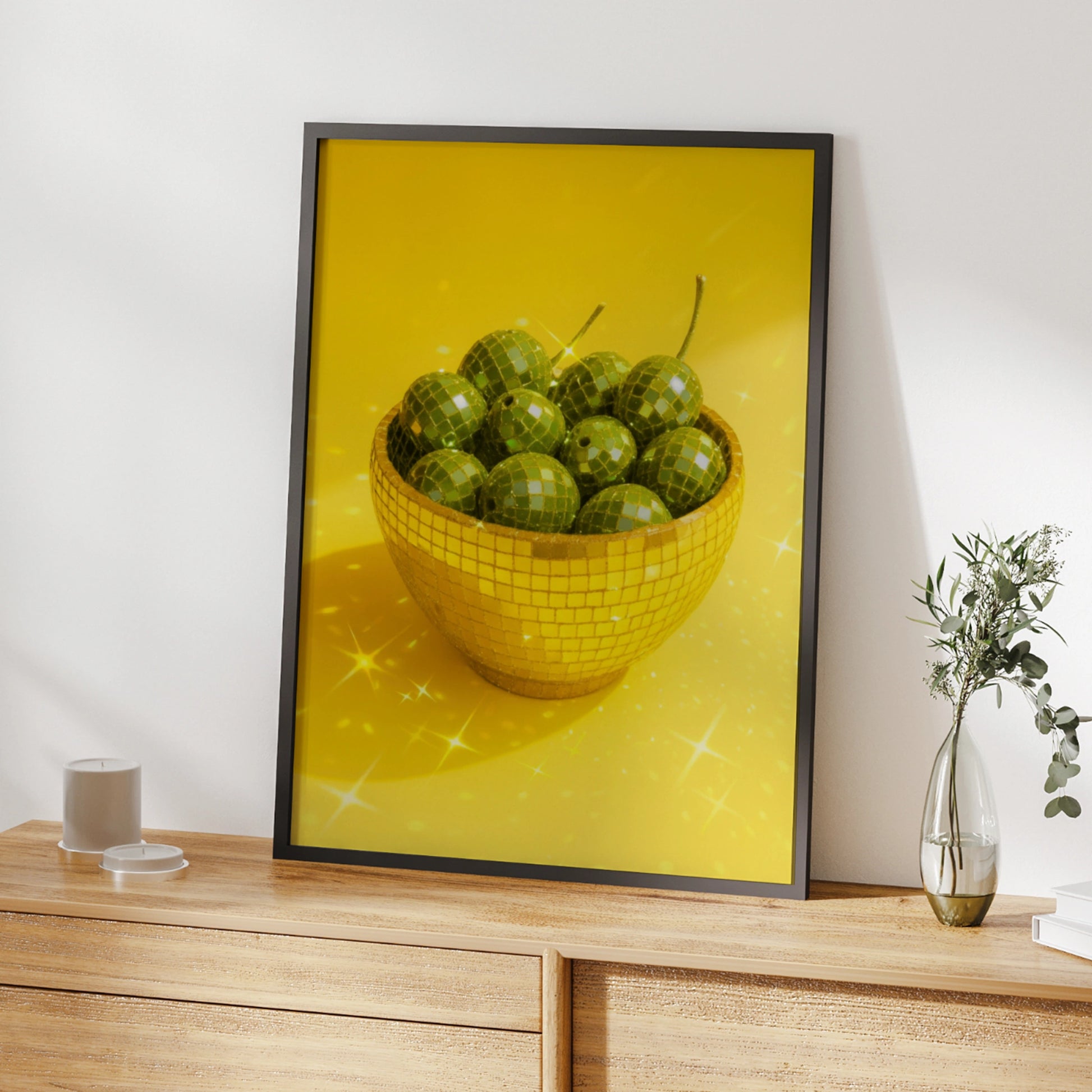 Gold disco mosaic bowl filled with green olives on a yellow background