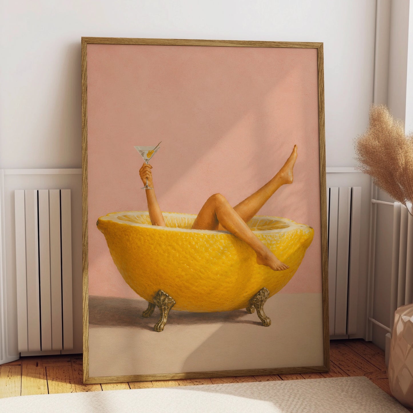 Woman relaxing in a giant lemon bath with a martini on a pink background