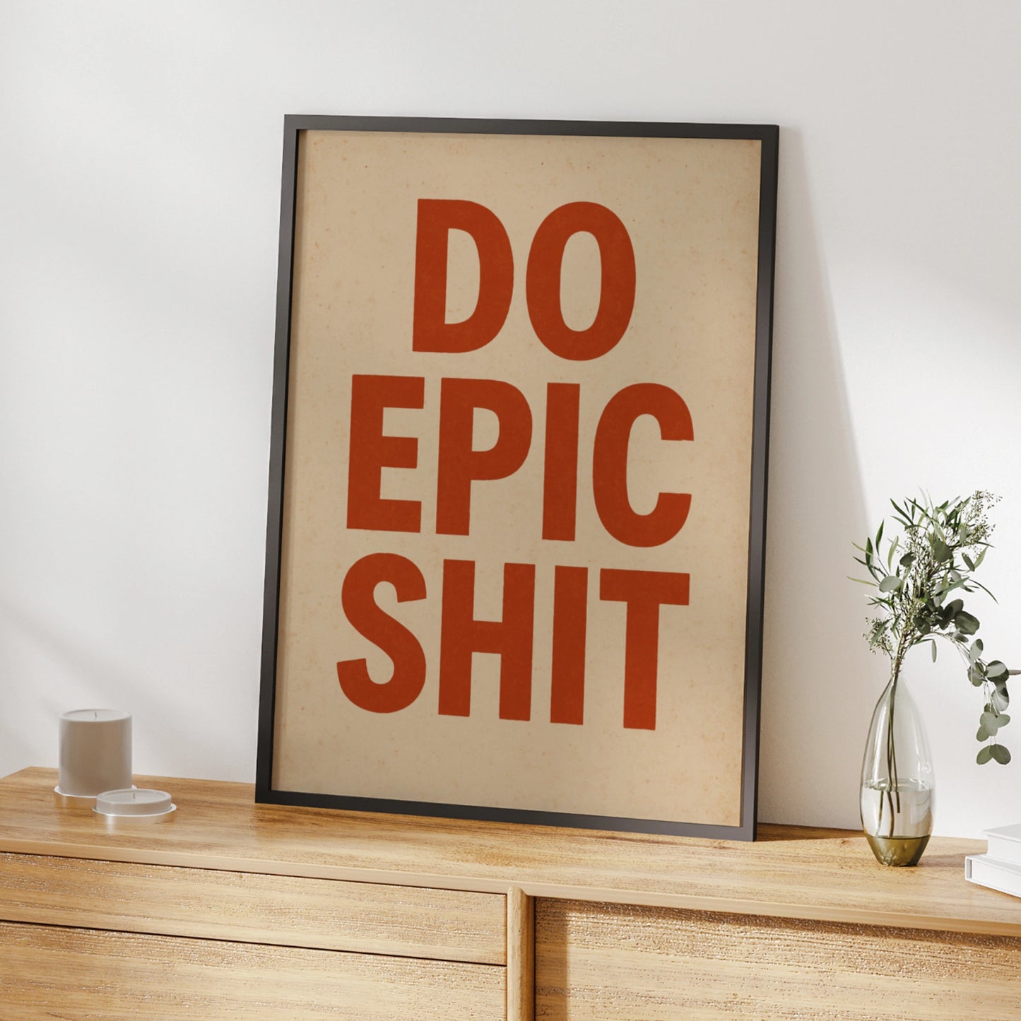 Do Epic Shit motivational poster with burnt-orange block lettering on a cream background