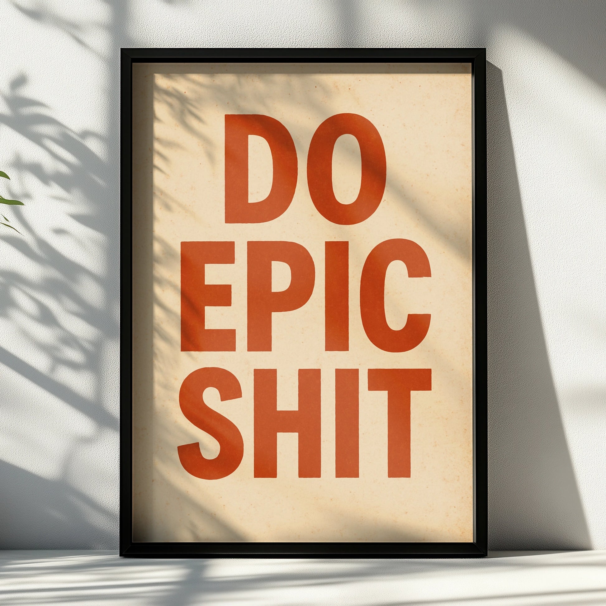 Do Epic Shit motivational poster with burnt-orange block lettering on a cream background